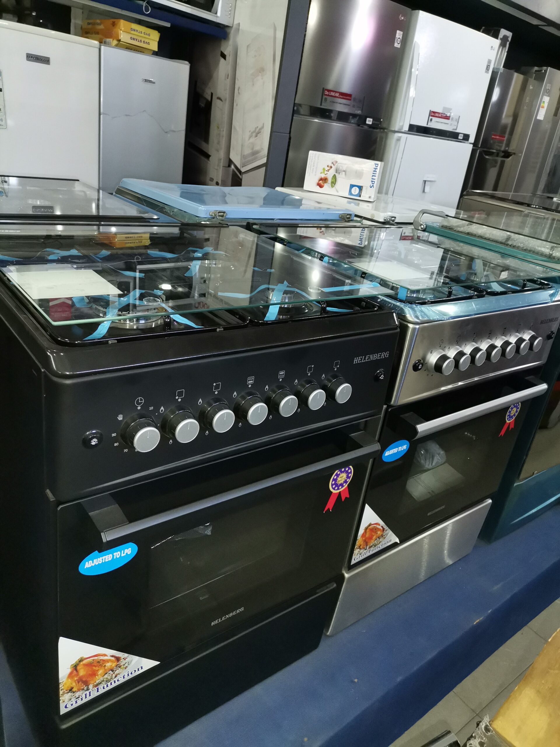 Cuisiniere 4 feux noir